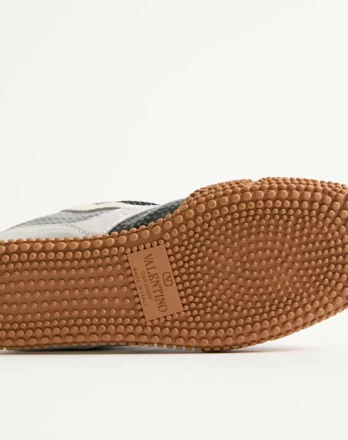 Amphibia Sneaker aus gummiertem Kalbsleder und laminiertem Nappaleder Amphibia Sneaker aus gummiertem Kalbsleder und laminiertem Nappaleder