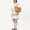 Bermudashorts aus Baumwollcanvas mit Blumenstickerei und Jacquardbesatz Bermudashorts aus Baumwollcanvas mit Blumenstickerei und Jacquardbesatz