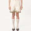 Bermudashorts aus Baumwollcanvas mit Blumenstickerei und Jacquardbesatz Bermudashorts aus Baumwollcanvas mit Blumenstickerei und Jacquardbesatz