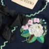 Bestickte Strickjacke Bestickte Strickjacke
