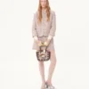 Bestickte Tweedjacke mit Bändern Bestickte Tweedjacke mit Bändern