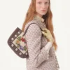Bestickte Tweedjacke mit Bändern Bestickte Tweedjacke mit Bändern