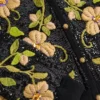 Bestickte Wollstrickjacke Bestickte Wollstrickjacke