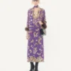 Besticktes Chiffonkleid mit Federn Besticktes Chiffonkleid mit Federn