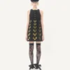 Besticktes kurzes Kleid aus Crêpe Couture Besticktes kurzes Kleid aus Crêpe Couture