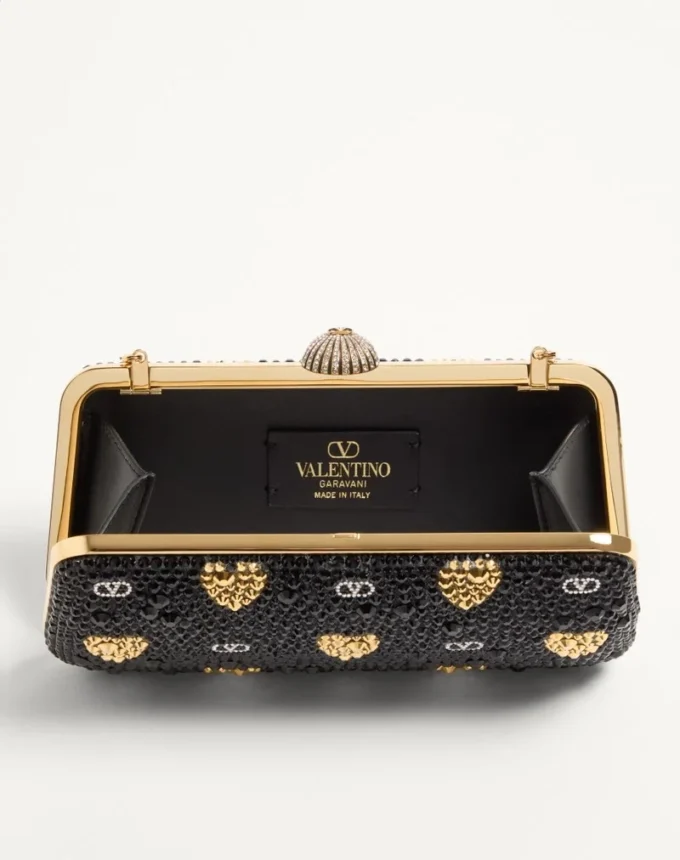 Carry Secrets Minaudiere mit Strass-Motiv „Cour de Cœur“ Carry Secrets Minaudiere mit Strass-Motiv „Cour de Cœur“