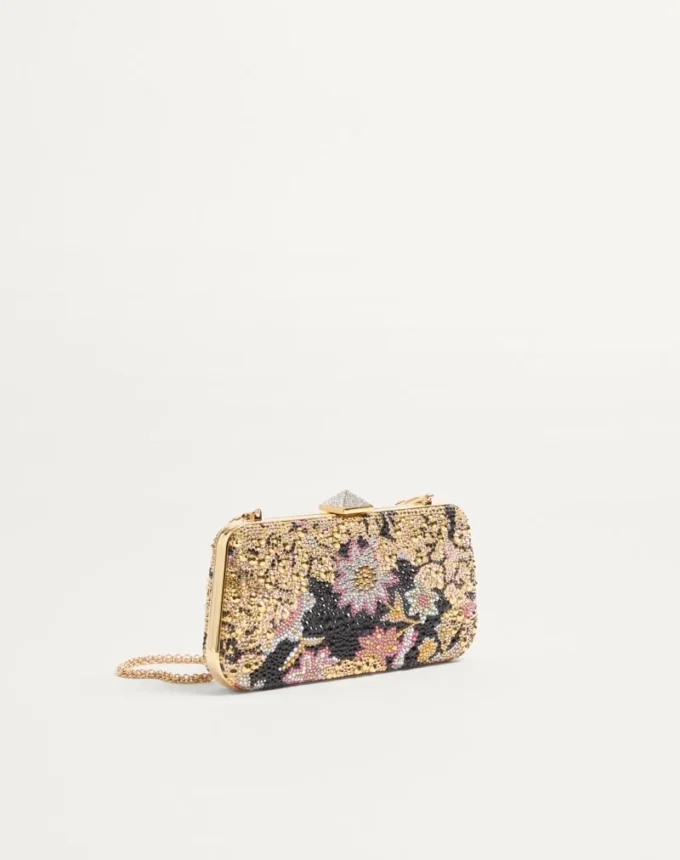 Carry Secrets Minaudiere mit Strasssteinen und Apres L’Hiver-Motiv Carry Secrets Minaudiere mit Strasssteinen und Apres L’Hiver-Motiv