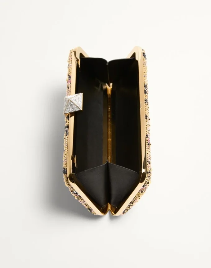 Carry Secrets Minaudiere mit Strasssteinen und Apres L’Hiver-Motiv Carry Secrets Minaudiere mit Strasssteinen und Apres L’Hiver-Motiv