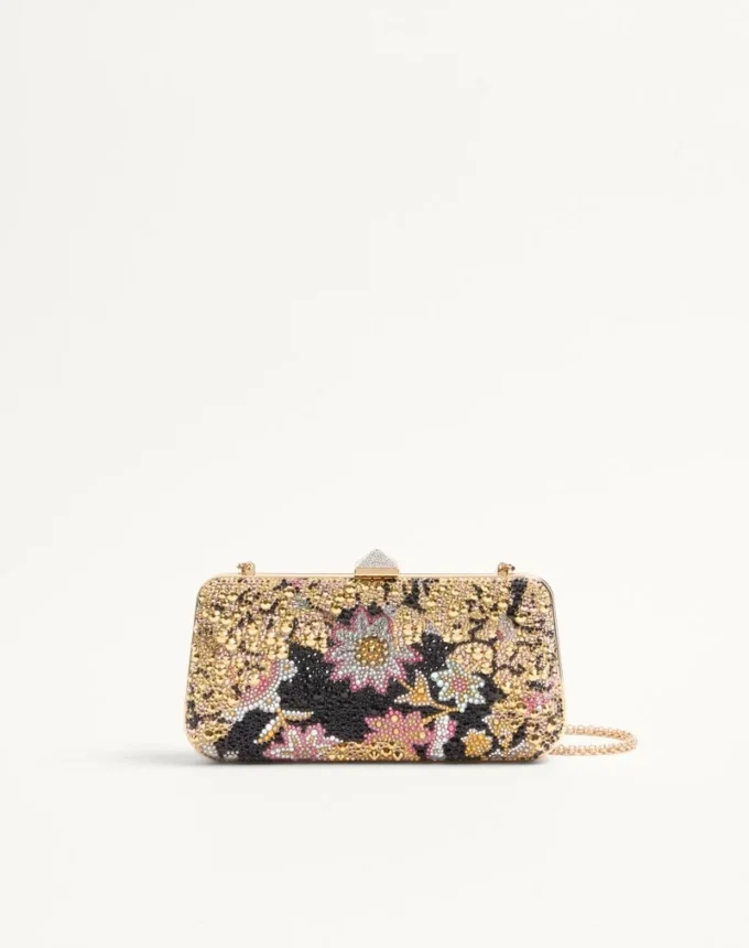 Carry Secrets Minaudiere mit Strasssteinen und Apres L’Hiver-Motiv Carry Secrets Minaudiere mit Strasssteinen und Apres L’Hiver-Motiv