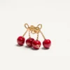 Cherryfic Ohrringe aus Metall und Emaille