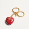 Coeur Royal Taschenanhänger mit Schlüsselring aus Metall und Emaille Coeur Royal Taschenanhänger mit Schlüsselring aus Metall und Emaille