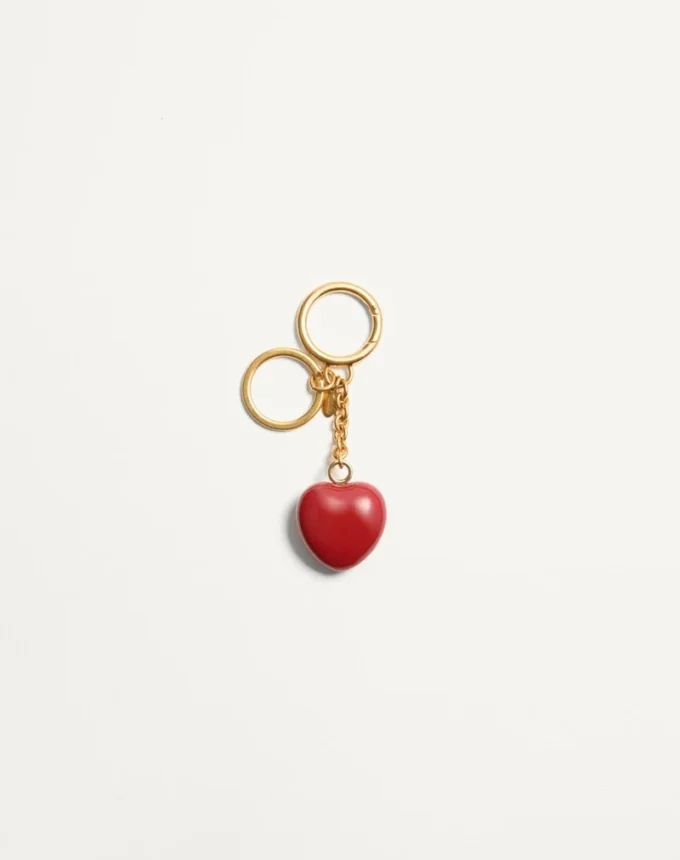 Coeur Royal Taschenanhänger mit Schlüsselring aus Metall und Emaille Coeur Royal Taschenanhänger mit Schlüsselring aus Metall und Emaille