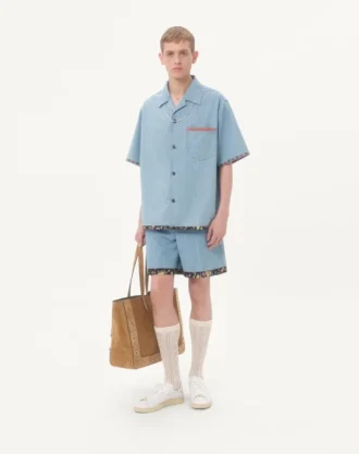 Denim-Bermudashorts mit Blumenprint am Saum