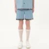 Denim-Bermudashorts mit Blumenprint am Saum Denim-Bermudashorts mit Blumenprint am Saum
