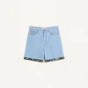 Denim-Bermudashorts mit Blumenprint am Saum Denim-Bermudashorts mit Blumenprint am Saum
