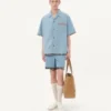 Denim-Bowlinghemd mit floralem Printbesatz Denim-Bowlinghemd mit floralem Printbesatz
