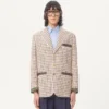 Einreihige Baumwolljacke mit Karomuster und bedruckten Kanten Einreihige Baumwolljacke mit Karomuster und bedruckten Kanten