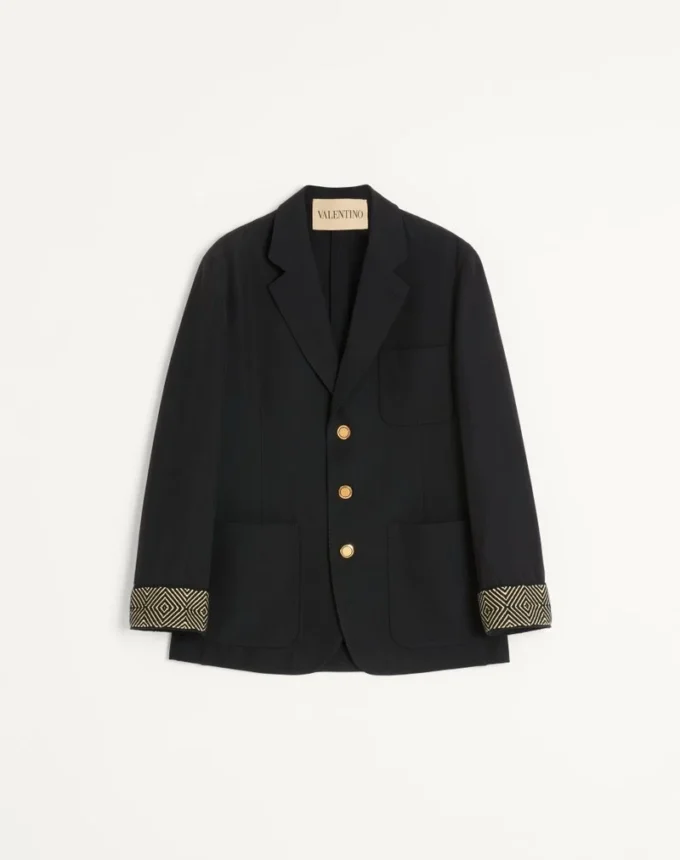 Einreihige Jacke aus Wolle und Baumwolle mit Jacquard-Besatz Einreihige Jacke aus Wolle und Baumwolle mit Jacquard-Besatz