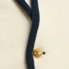 Einreihige Jacke aus Wolle und Baumwolle mit Torchon-Paspelierung Einreihige Jacke aus Wolle und Baumwolle mit Torchon-Paspelierung