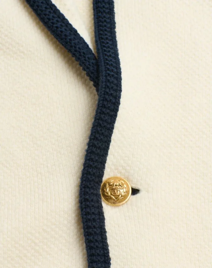 Einreihige Jacke aus Wolle und Baumwolle mit Torchon-Paspelierung Einreihige Jacke aus Wolle und Baumwolle mit Torchon-Paspelierung