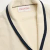 Einreihige Jacke aus Wolle und Baumwolle mit Torchon-Paspelierung Einreihige Jacke aus Wolle und Baumwolle mit Torchon-Paspelierung