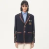 Einreihige Leinenjacke mit Perlenstickerei und Aufnähern Einreihige Leinenjacke mit Perlenstickerei und Aufnähern