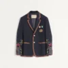 Einreihige Leinenjacke mit Perlenstickerei und Aufnähern Einreihige Leinenjacke mit Perlenstickerei und Aufnähern
