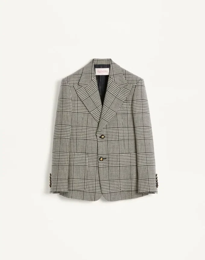 Einreihige Wolljacke mit Karomuster auf Hahnentritt Einreihige Wolljacke mit Karomuster auf Hahnentritt