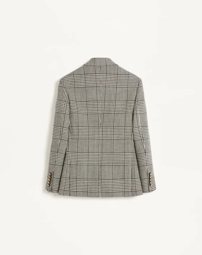 Einreihige Wolljacke mit Karomuster auf Hahnentritt Einreihige Wolljacke mit Karomuster auf Hahnentritt
