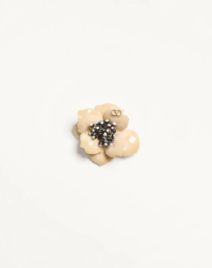 Fleur Lumineuse Brosche aus Metall, Emaille und Stoff Fleur Lumineuse Brosche aus Metall, Emaille und Stoff
