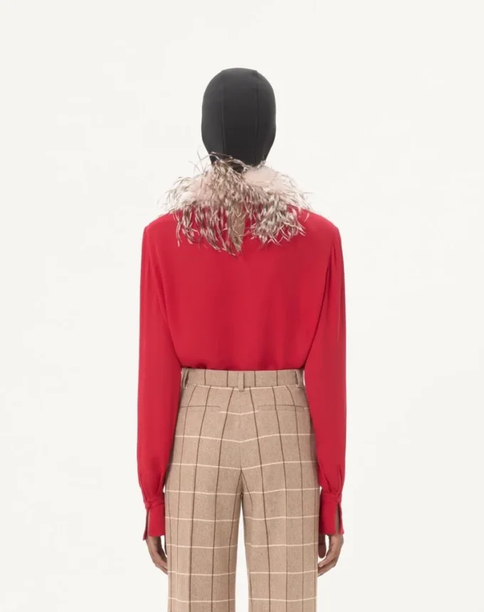 Georgette-Oberteil mit Federn Georgette-Oberteil mit Federn