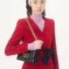 Jacke aus Wollkrepp mit kontrastierender Schleife Jacke aus Wollkrepp mit kontrastierender Schleife