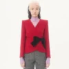 Jacke aus Wollkrepp mit kontrastierender Schleife Jacke aus Wollkrepp mit kontrastierender Schleife