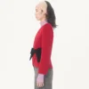 Jacke aus Wollkrepp mit kontrastierender Schleife Jacke aus Wollkrepp mit kontrastierender Schleife