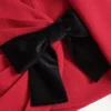 Jacke aus Wollkrepp mit kontrastierender Schleife Jacke aus Wollkrepp mit kontrastierender Schleife