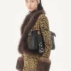 Jacquard-Strickjacke mit Animal-Print und Lurex Jacquard-Strickjacke mit Animal-Print und Lurex
