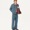 Jeansjacke mit Perlenstickerei und bedruckten Kanten Jeansjacke mit Perlenstickerei und bedruckten Kanten