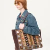 Jeansjacke mit Perlenstickerei und bedruckten Kanten Jeansjacke mit Perlenstickerei und bedruckten Kanten