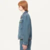Jeansjacke mit Perlenstickerei und bedruckten Kanten Jeansjacke mit Perlenstickerei und bedruckten Kanten