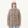 Kaschmir-Strickjacke mit Animal-Print Kaschmir-Strickjacke mit Animal-Print