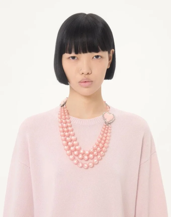 Kaschmirpullover mit Federn Kaschmirpullover mit Federn