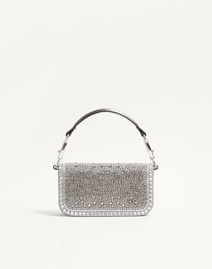 Kleine Valentino Garavani Locò Schultertasche mit Strasssteinen Kleine Valentino Garavani Locò Schultertasche mit Strasssteinen