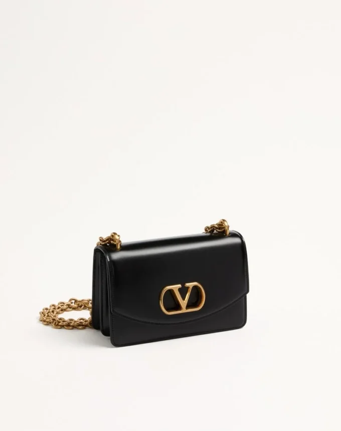Kleine Valentino Garavani Vain Schultertasche aus glänzendem Kalbsleder Kleine Valentino Garavani Vain Schultertasche aus glänzendem Kalbsleder