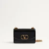 Kleine Valentino Garavani Vain Schultertasche aus glänzendem Kalbsleder Kleine Valentino Garavani Vain Schultertasche aus glänzendem Kalbsleder