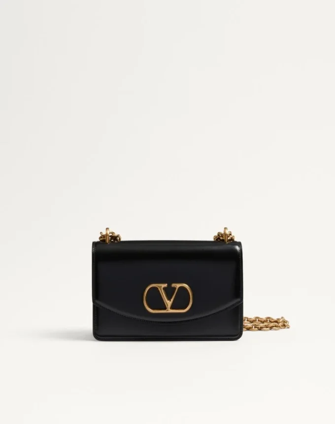 Kleine Valentino Garavani Vain Schultertasche aus glänzendem Kalbsleder Kleine Valentino Garavani Vain Schultertasche aus glänzendem Kalbsleder
