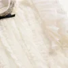 Kurzes Kleid aus besticktem leichtem Leinen Kurzes Kleid aus besticktem leichtem Leinen