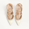 Lackleder-Pumps mit Rockstud-Käfig 100 mm Lackleder-Pumps mit Rockstud-Käfig 100 mm
