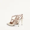 Lackleder-Pumps mit Rockstud-Käfig 100 mm Lackleder-Pumps mit Rockstud-Käfig 100 mm