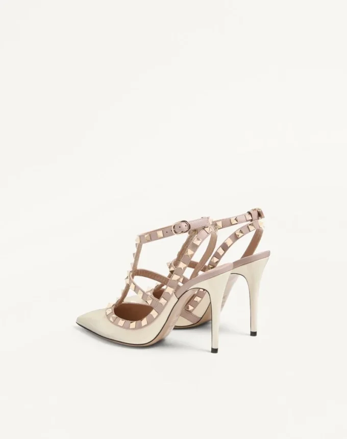 Lackleder-Pumps mit Rockstud-Käfig 100 mm Lackleder-Pumps mit Rockstud-Käfig 100 mm