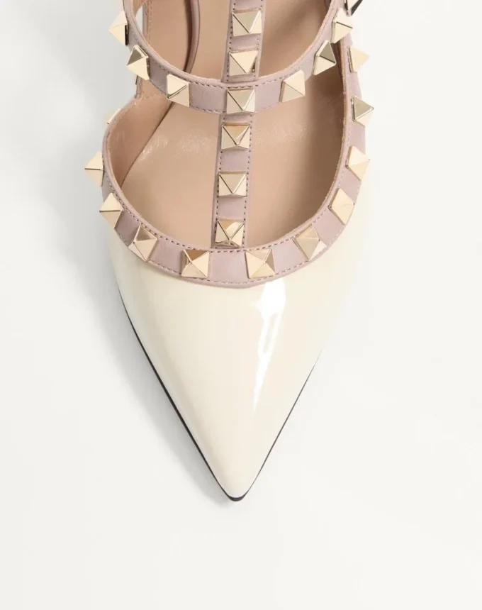 Lackleder-Pumps mit Rockstud-Käfig 100 mm Lackleder-Pumps mit Rockstud-Käfig 100 mm